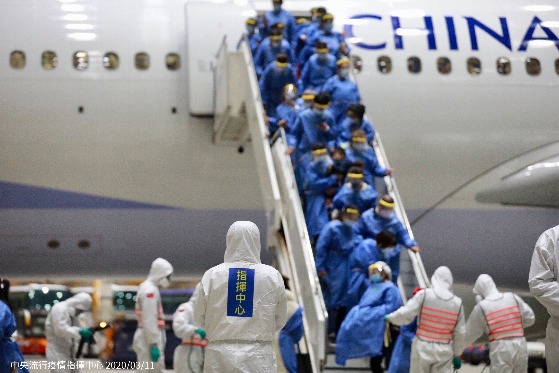 The Taiwanese people on a charter flight arrive at Taiwan Taoyuan International Airport.